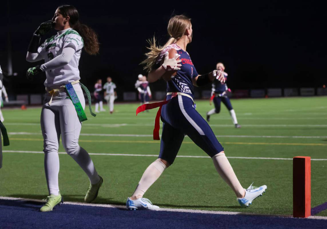 Coronado's Marylouise Tsunis scores a touchdown against Green Valley during a flag football gam ...