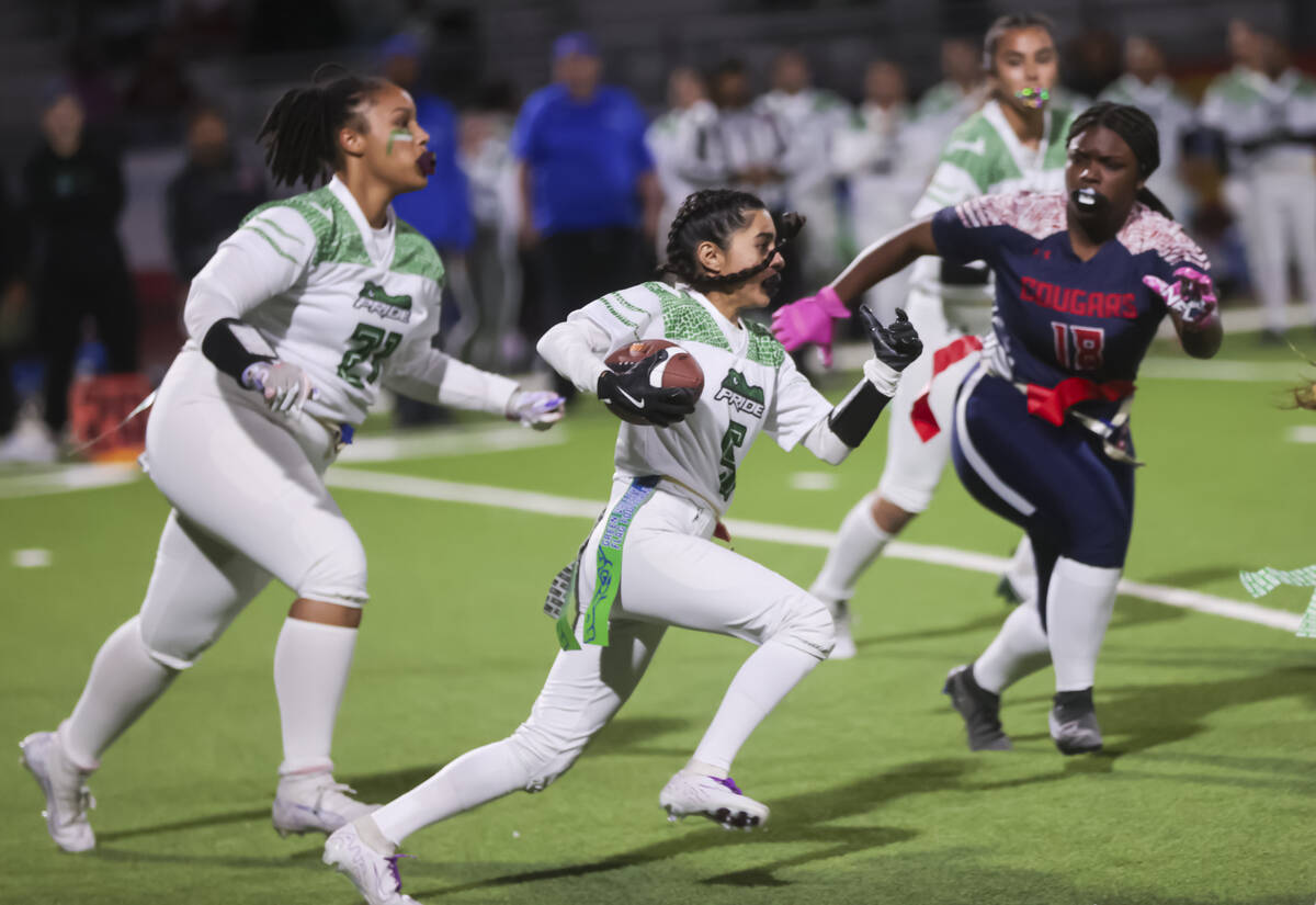 Green Valley's Aundrea Velez (5) runs the ball during a flag football game at Coronado High Sch ...