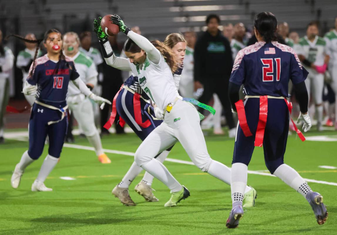 Green Valley's Lyla Baxter (7) gets stopped by Coronado during a flag football game at Coronado ...