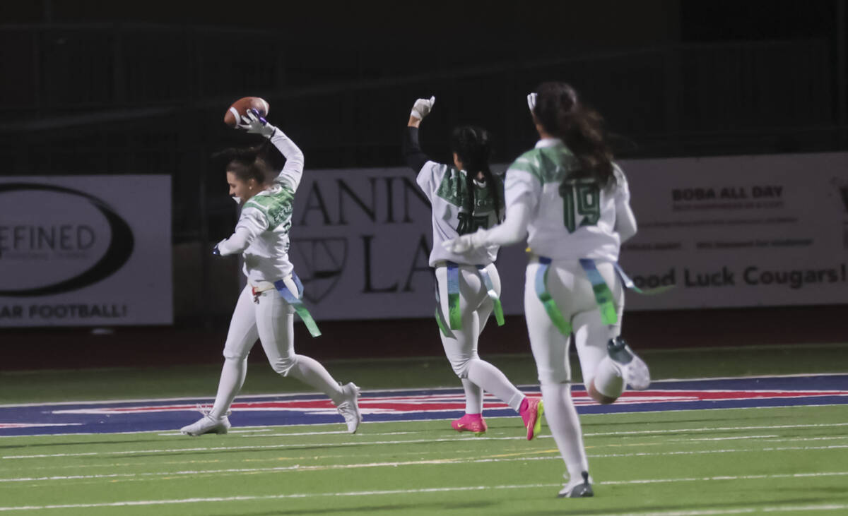 Green Valley's Piper Carver-Coons (3) scores a touchdown against Coronado during a flag footbal ...