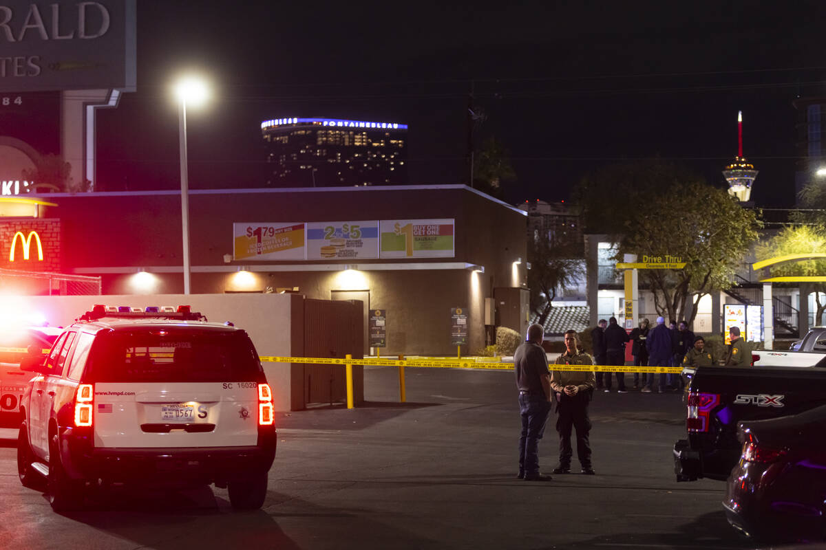 Las Vegas police investigate the scene of a homicide at a McDonald’s on Paradise Road on Mond ...