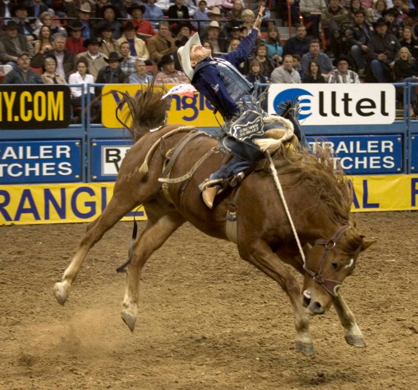 Billy Etbauer, of Edmond, Okla., rides Wasp to a score of 86.5 to tie for first in the seventh ...