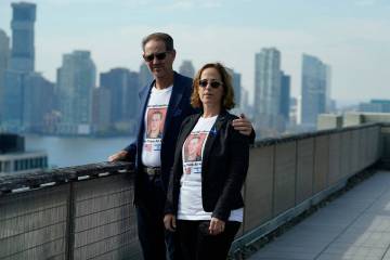 Ronen (left) and Orna Neutra, parents of Omer Neutra, pose for a photo in New York City on Nov. ...