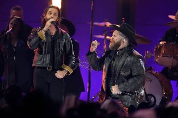 Thomas Rhett, left, and Teddy Swims perform a medley during the 58th Annual CMA Awards on Wedne ...