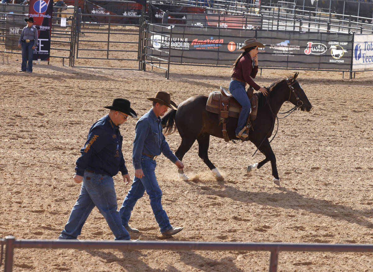 Jessie Wolfe of Colorado rides her horse, Juan, during practice at the Core Arena, a permanent ...