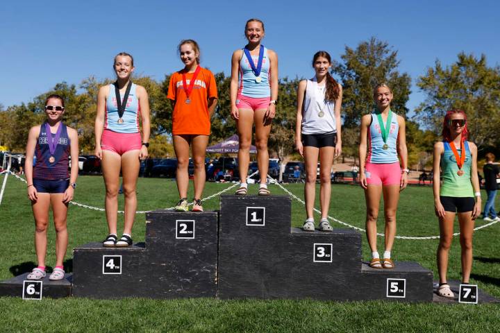 (Left to right) The 5A Southern Region girls cross country meet winners Brooke-Lynne Miller of ...