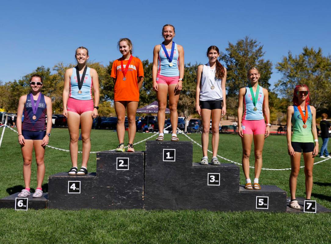 (Left to right) The 5A Southern Region girls cross country meet winners Brooke-Lynne Miller of ...