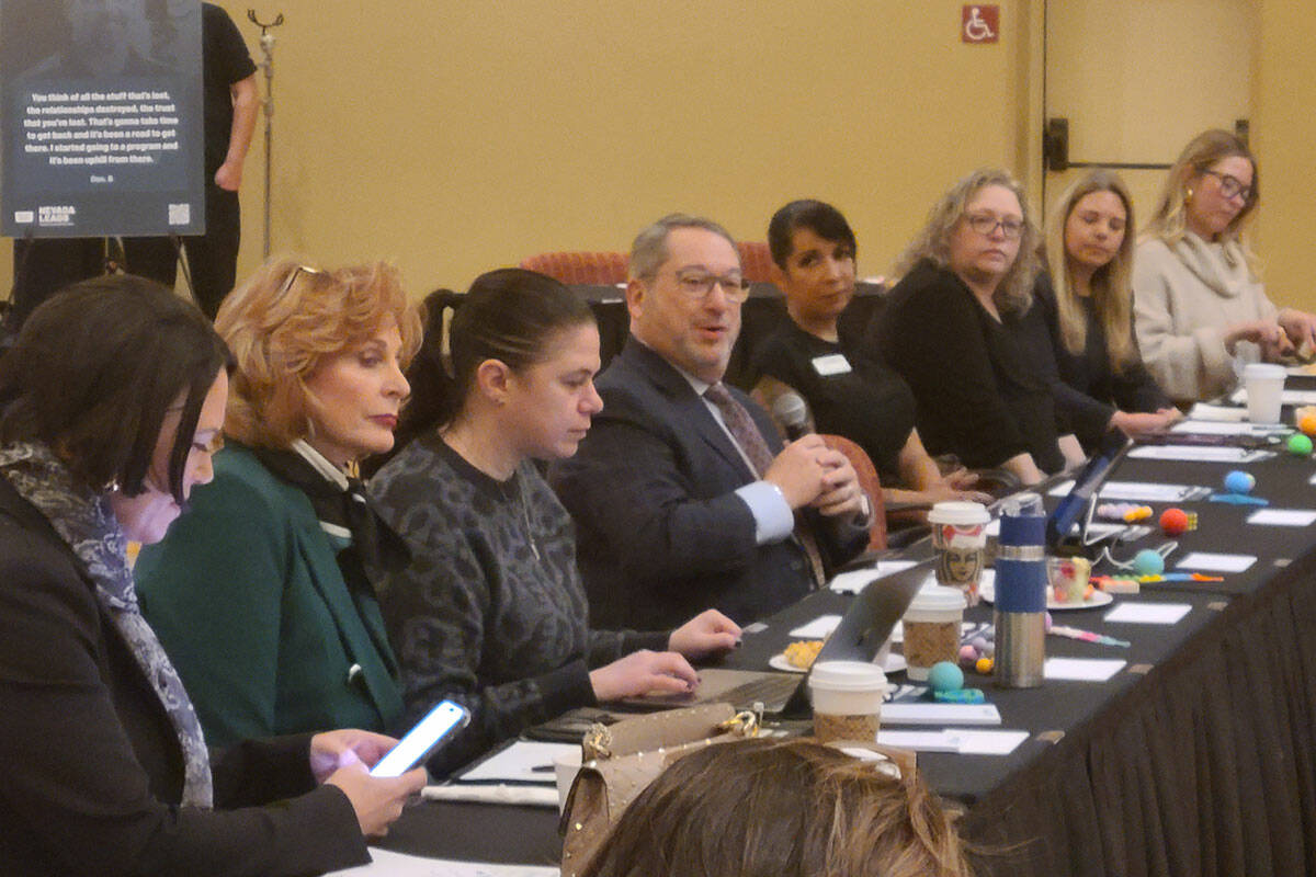 Alan Feldman, chair of the Advisory Committee on Problem Gambling, center, opens the Project Wo ...