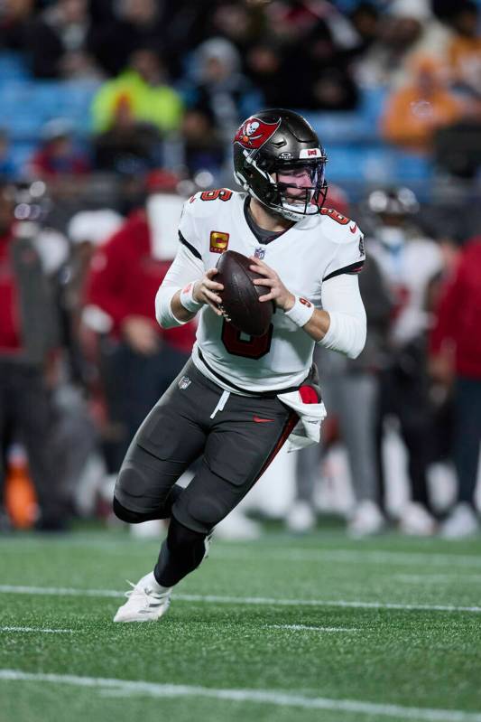 Tampa Bay Buccaneers quarterback Baker Mayfield (6) looks for an open receiver during an NFL Fo ...