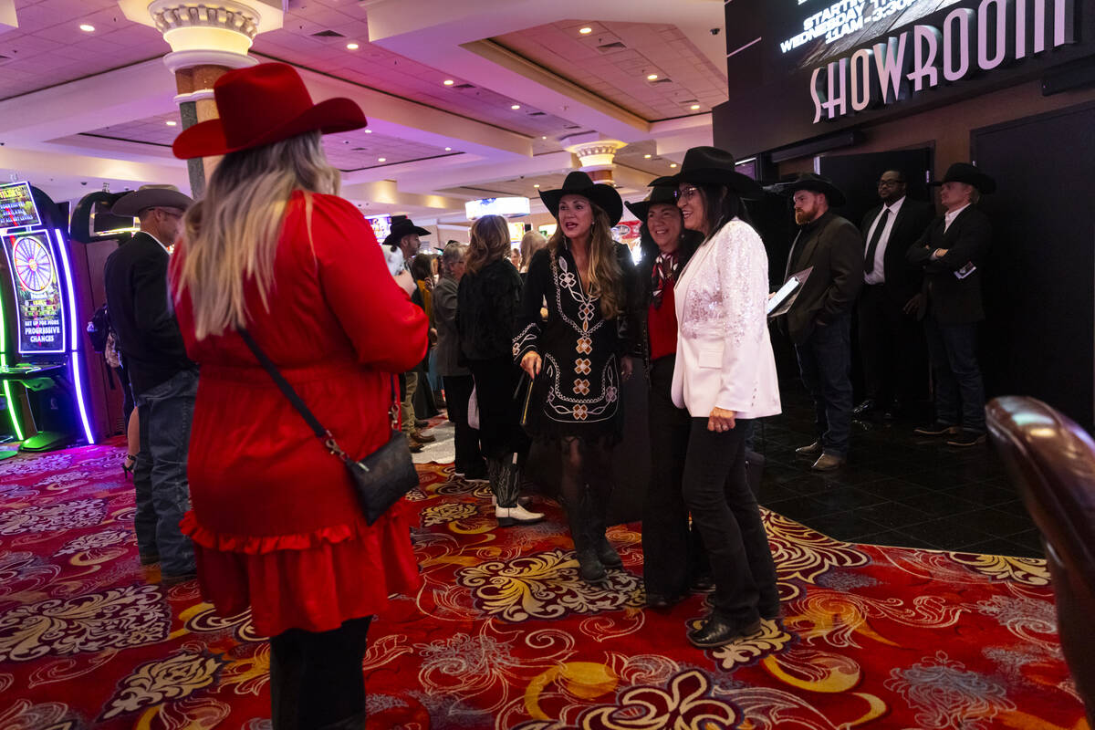 Judy Wagner, right, poses and mingles with friends before the premier of documentary "Nice ...