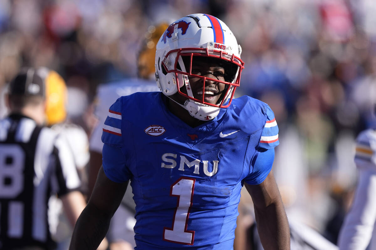 SMU running back Brashard Smith (1) smiles after scoring a touchdown during the first half of a ...