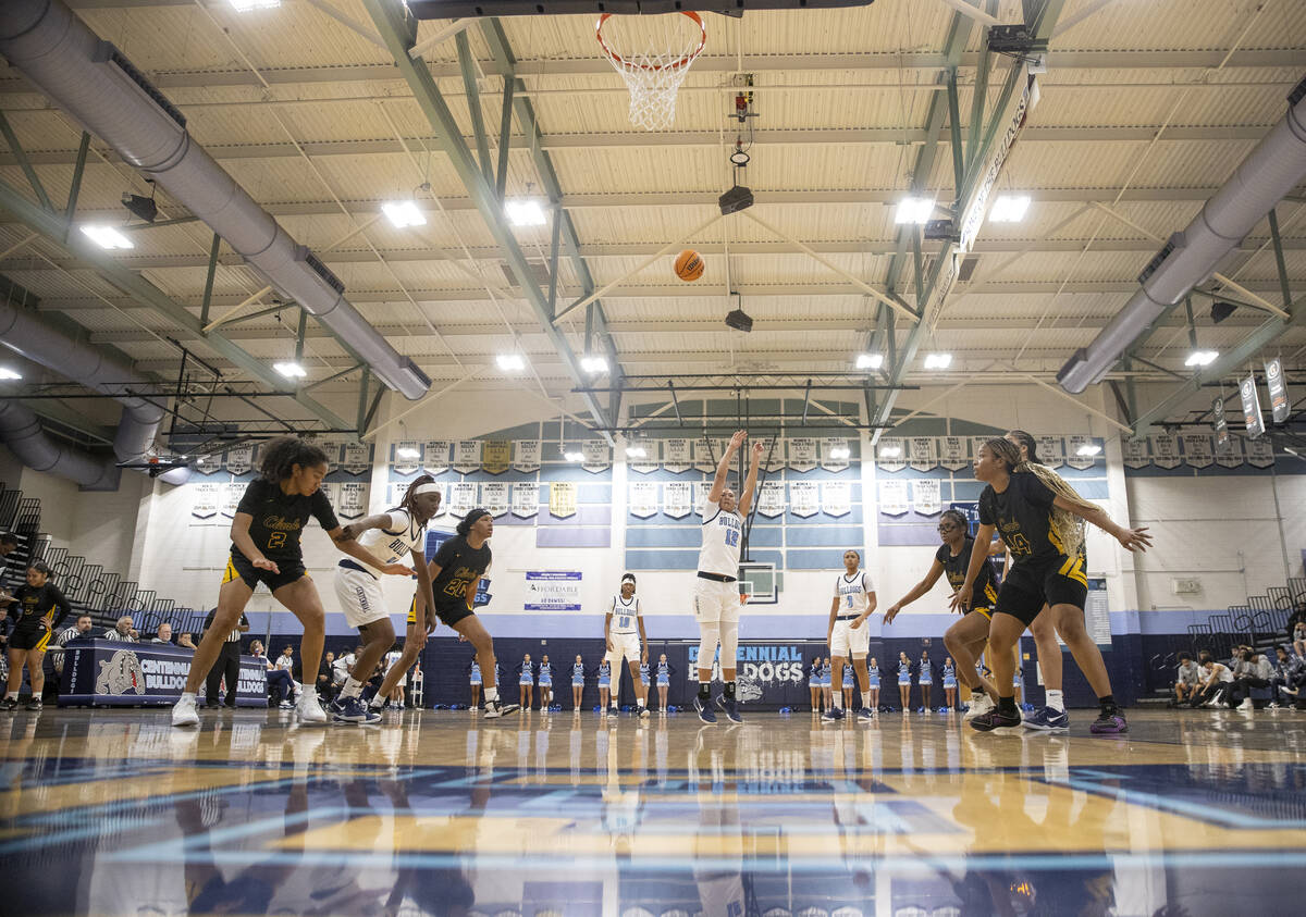 Centennial senior Ayla Williams (12) attempts a free-throw during the high school girls basketb ...