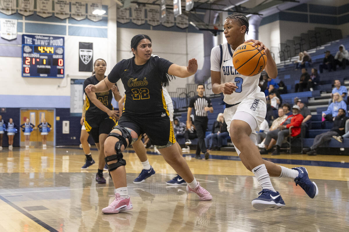 Centennial freshman D'arrah Mitchell (3) rushes past Clark’s Jaslene Ramos (22) during the hi ...