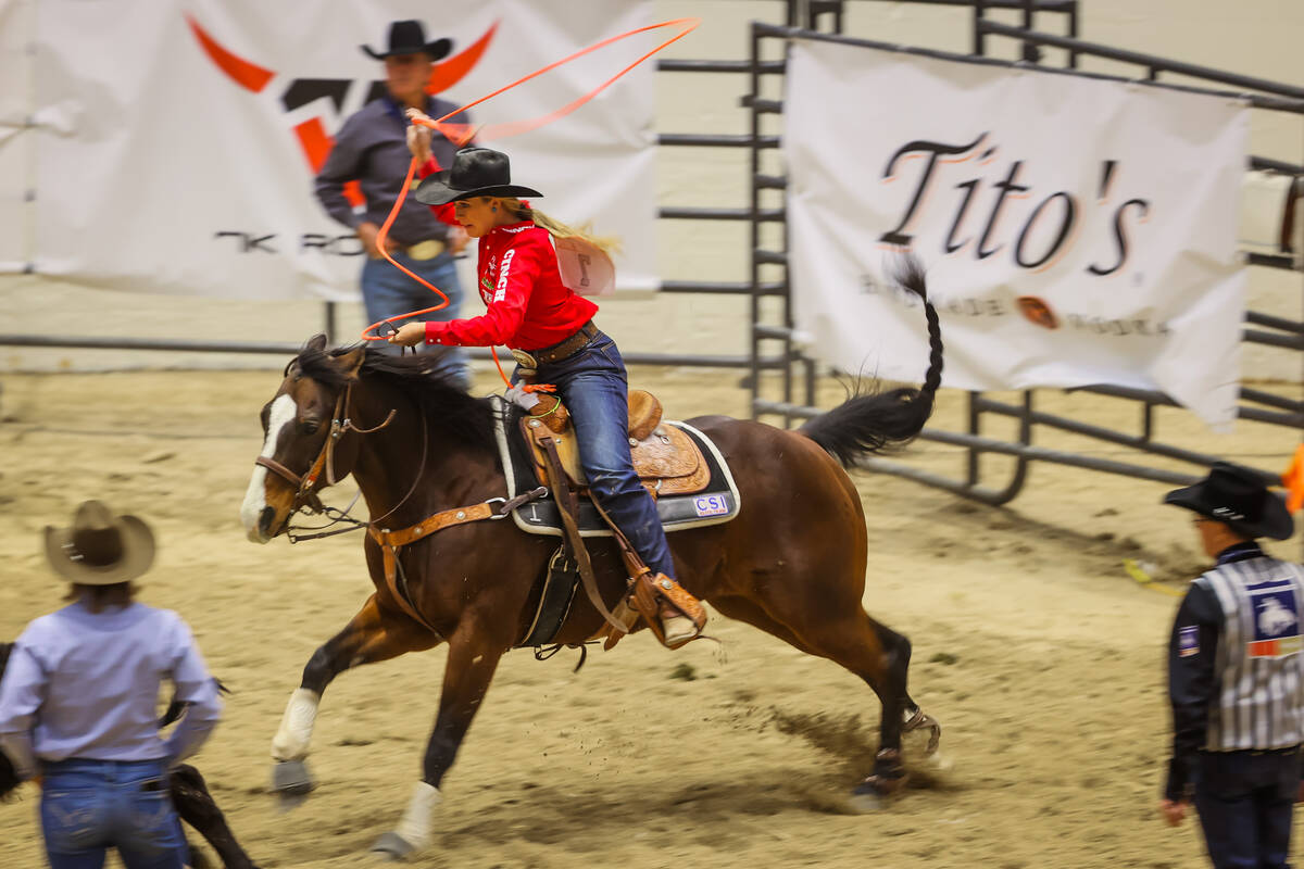 Breakaway roper Maddy Deerman chases a calf out of the chute during the final day of the Nation ...