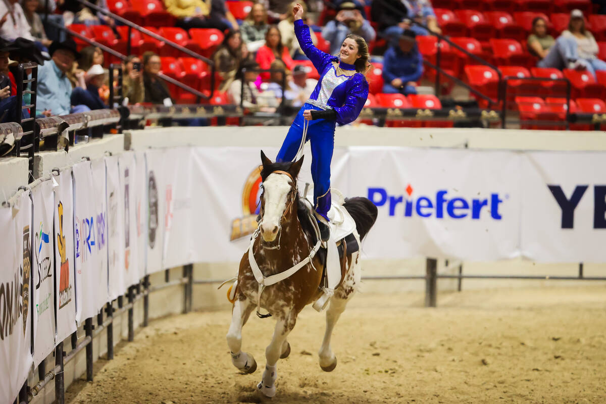 A trick rider performs during the final day of the National Finals Breakaway Roping event at So ...