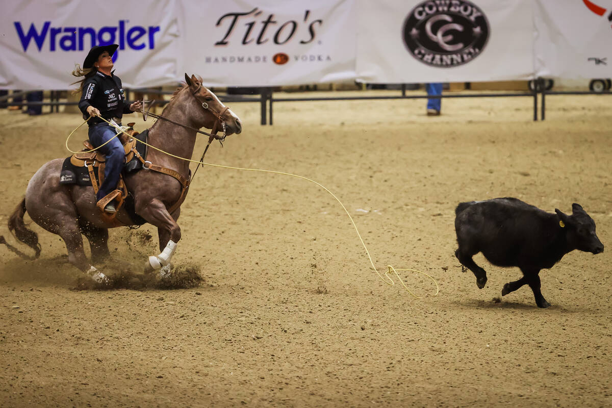 Breakaway roper Jackie Crawford misses the calf during the final day of the National Finals Bre ...