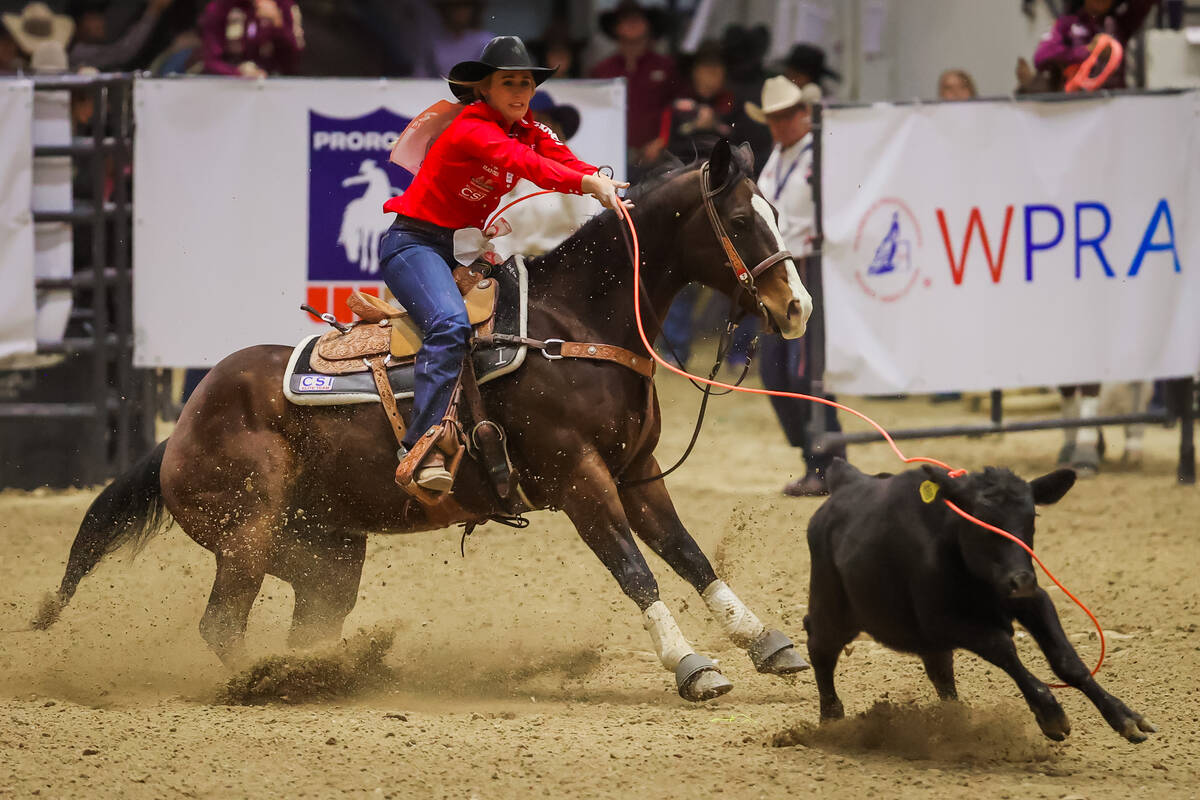 Breakaway roper Maddy Deerman chases a calf out of the chute during the final day of the Nation ...