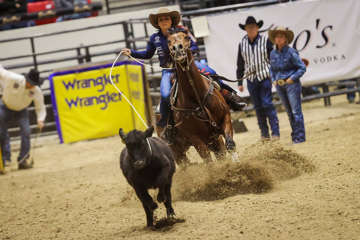 Breakaway roper Macy Young ropes a calf during the final day of the National Finals Breakaway R ...