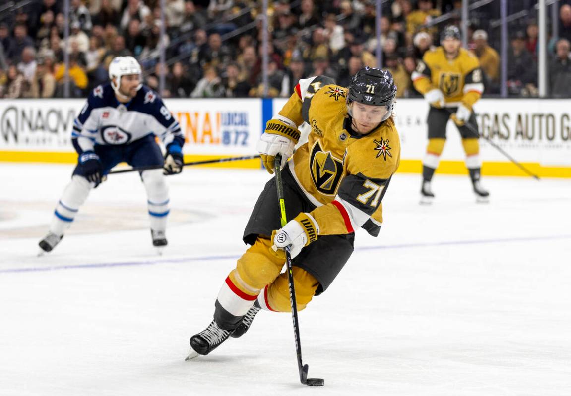 Golden Knights center William Karlsson (71) controls the puck during the NHL hockey game agains ...