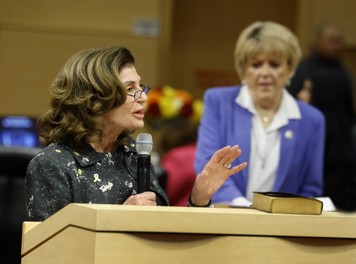 Mayor Shelley Berkley speaks as former mayor Carolyn Goodman, right, looks on after Berkley swo ...