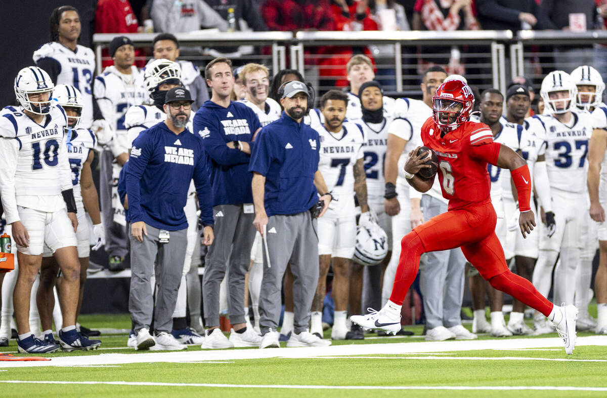 UNLV quarterback Hajj-Malik Williams (6) runs with the ball during the NCAA college football ga ...