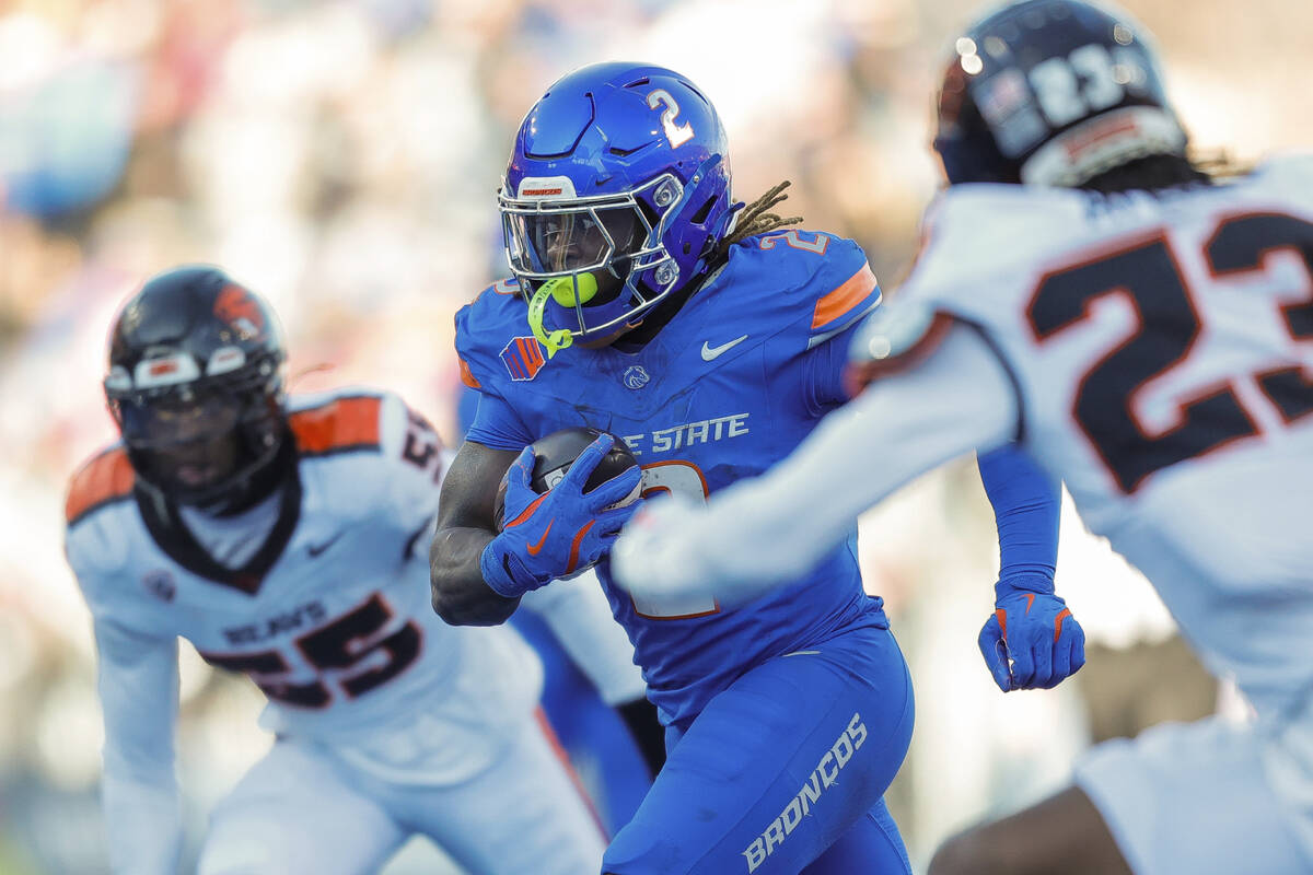 Boise State running back Ashton Jeanty (2) runs with the ball late in the second half against O ...