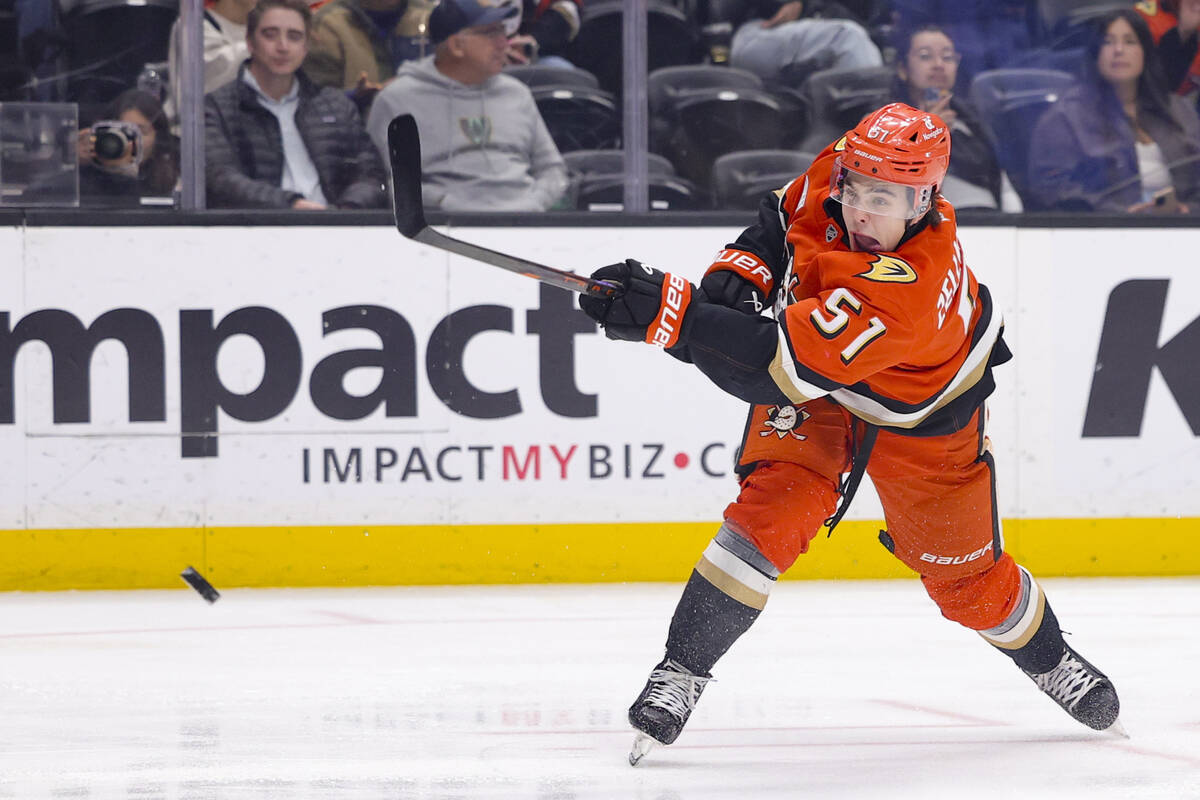 Anaheim Ducks defenseman Olen Zellweger shoots during the first period of an NHL hockey game ag ...