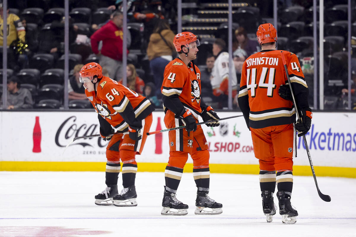 From left, Anaheim Ducks right wing Sam Colangelo, defenseman Cam Fowler, and left wing Ross Jo ...