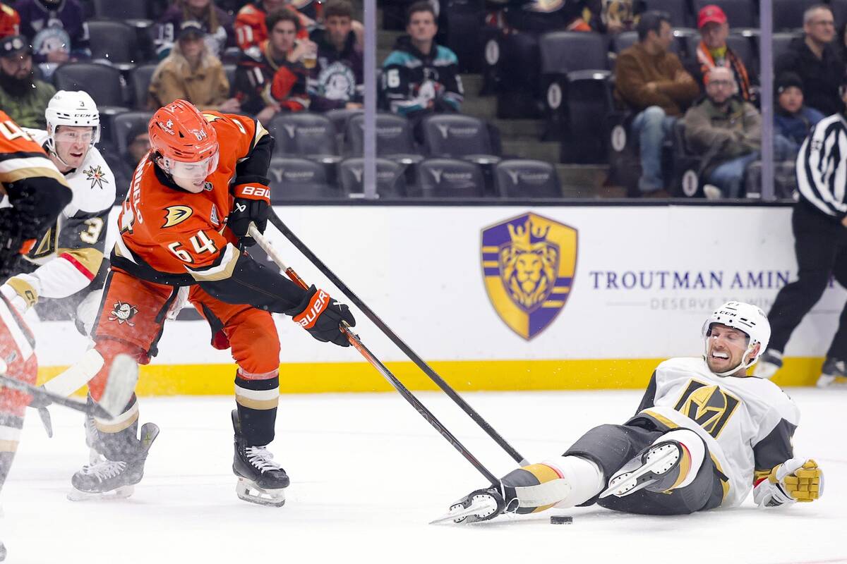 Anaheim Ducks right wing Sam Colangelo, left, vies for the puck against Vegas Golden Knights ce ...