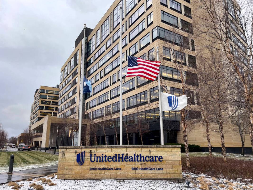 The UnitedHealthcare headquarters in Minnetonka, Minn., lowered its flags to half-staff on Wedn ...