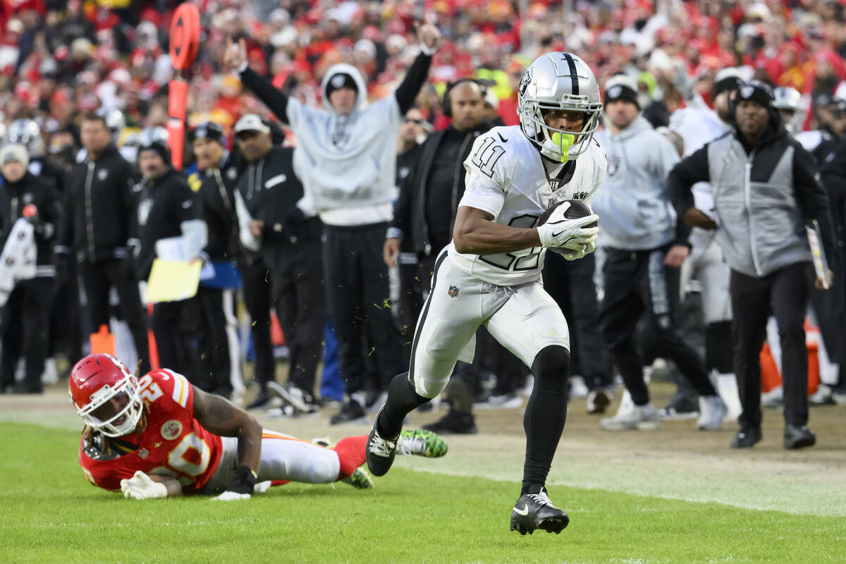 Las Vegas Raiders wide receiver Tre Tucker (11) runs in for a touchdown after Kansas City Chief ...