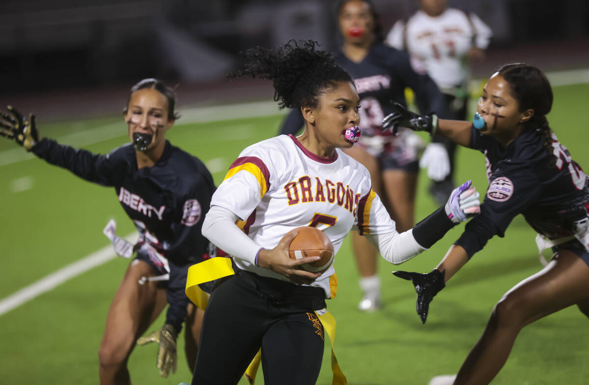 Del Sol’s Joselynn Carrington runs the ball during a flag football game at Liberty High ...