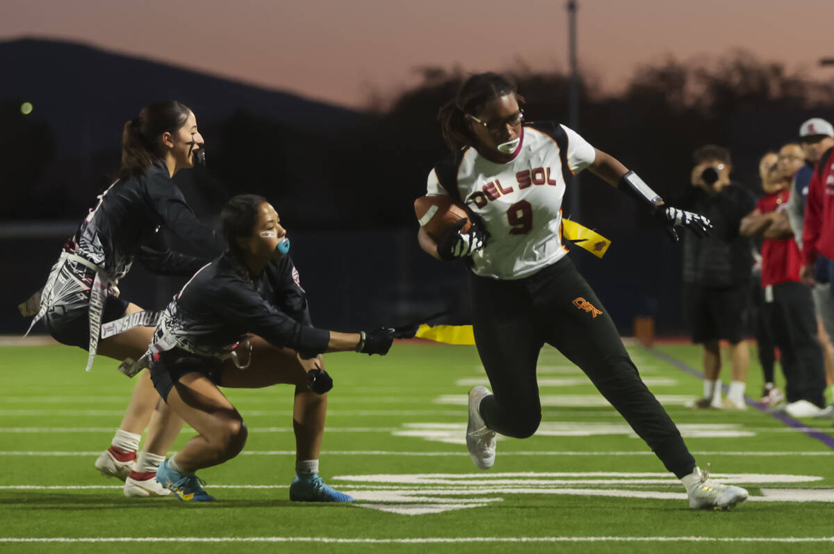 Del Sol’s Leilani Grayson (9) runs the ball during a flag football game at Liberty High ...