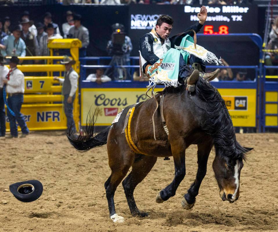 Bareback rider Bradlee Miller rides True Grit to a winning time during National Finals Rodeo Da ...