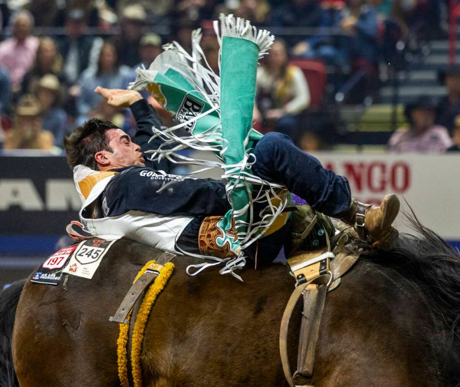 Bareback rider Bradlee Miller rides True Grit to a winning time during National Finals Rodeo Da ...