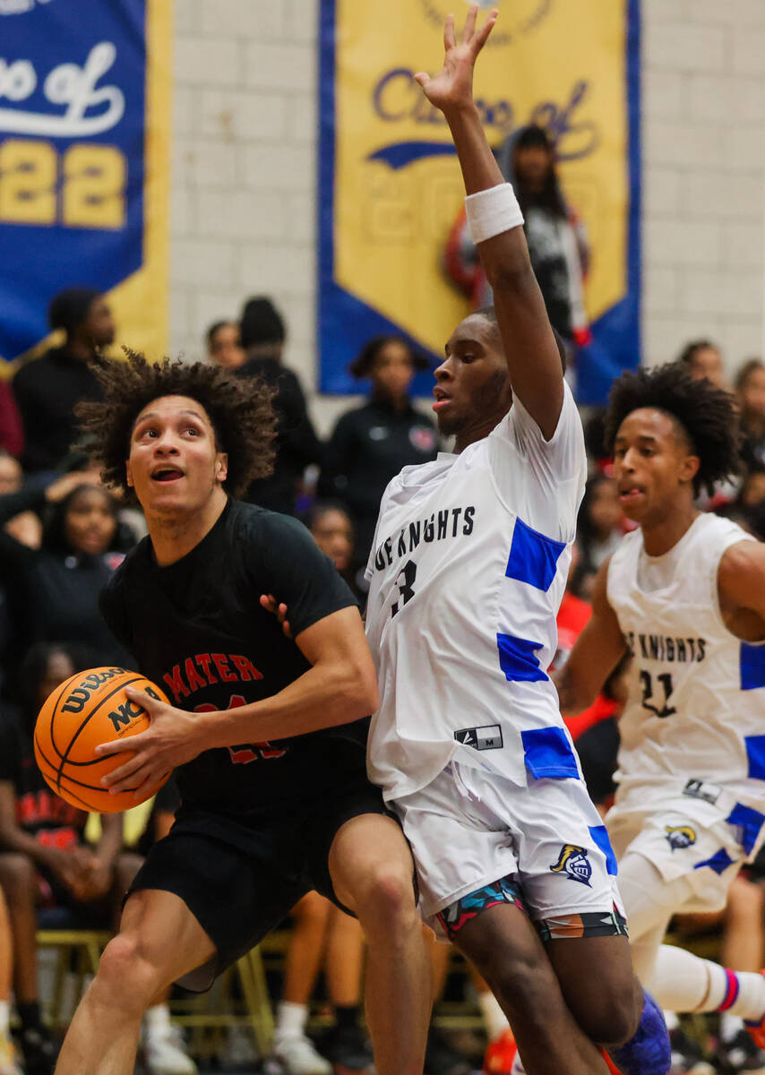 Mater shooting guard Deven Taylor (21) drives the ball as Democracy Prep guard DaShaun Harris ( ...