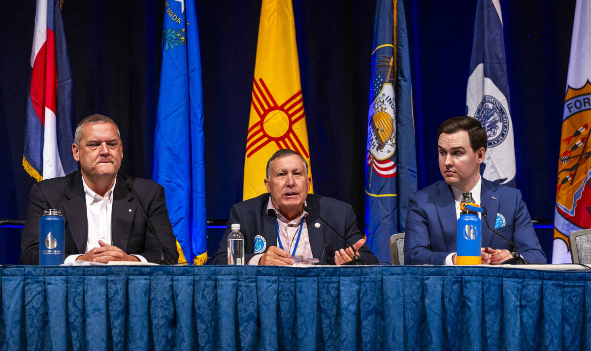 (From left) John Entsminger of Nevada looks on as Tom Buschatzke of Arizona speaks next to JB H ...