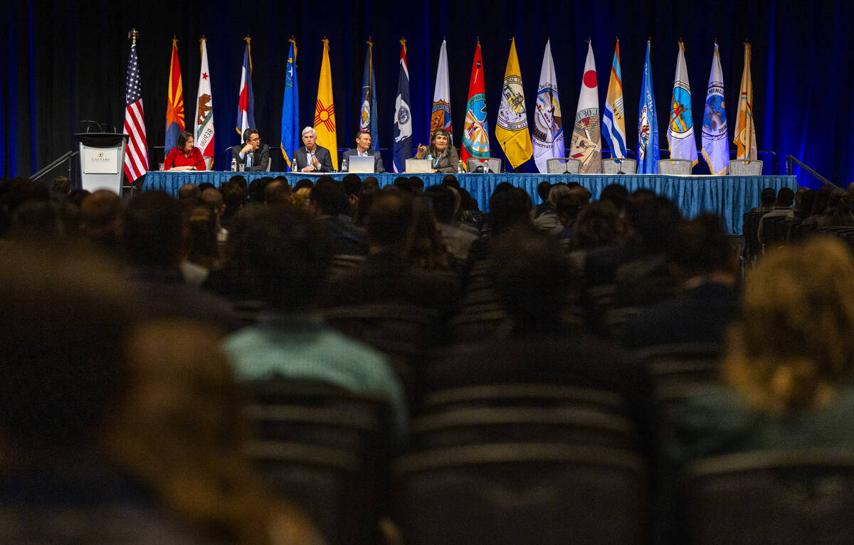 A panelist speaks during a session titled "Keeping the Peace Among the Pieces: The Risks of Lit ...