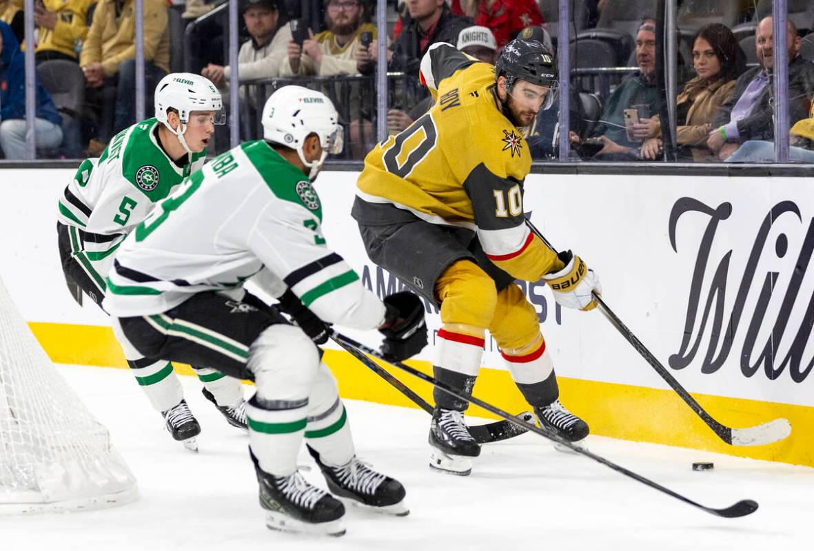 Golden Knights center Nicolas Roy (10) looks to control the puck during the third period of the ...