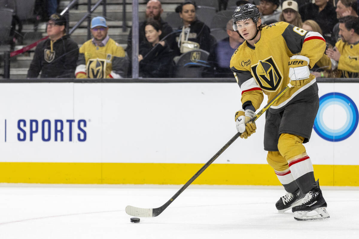 Golden Knights defenseman Kaedan Korczak (6) passes the puck during the NHL hockey game against ...