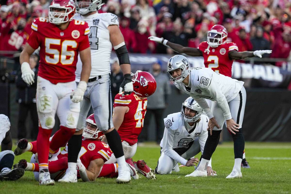 Las Vegas Raiders place kicker Daniel Carlson (2) reacts after missing a field goal against the ...