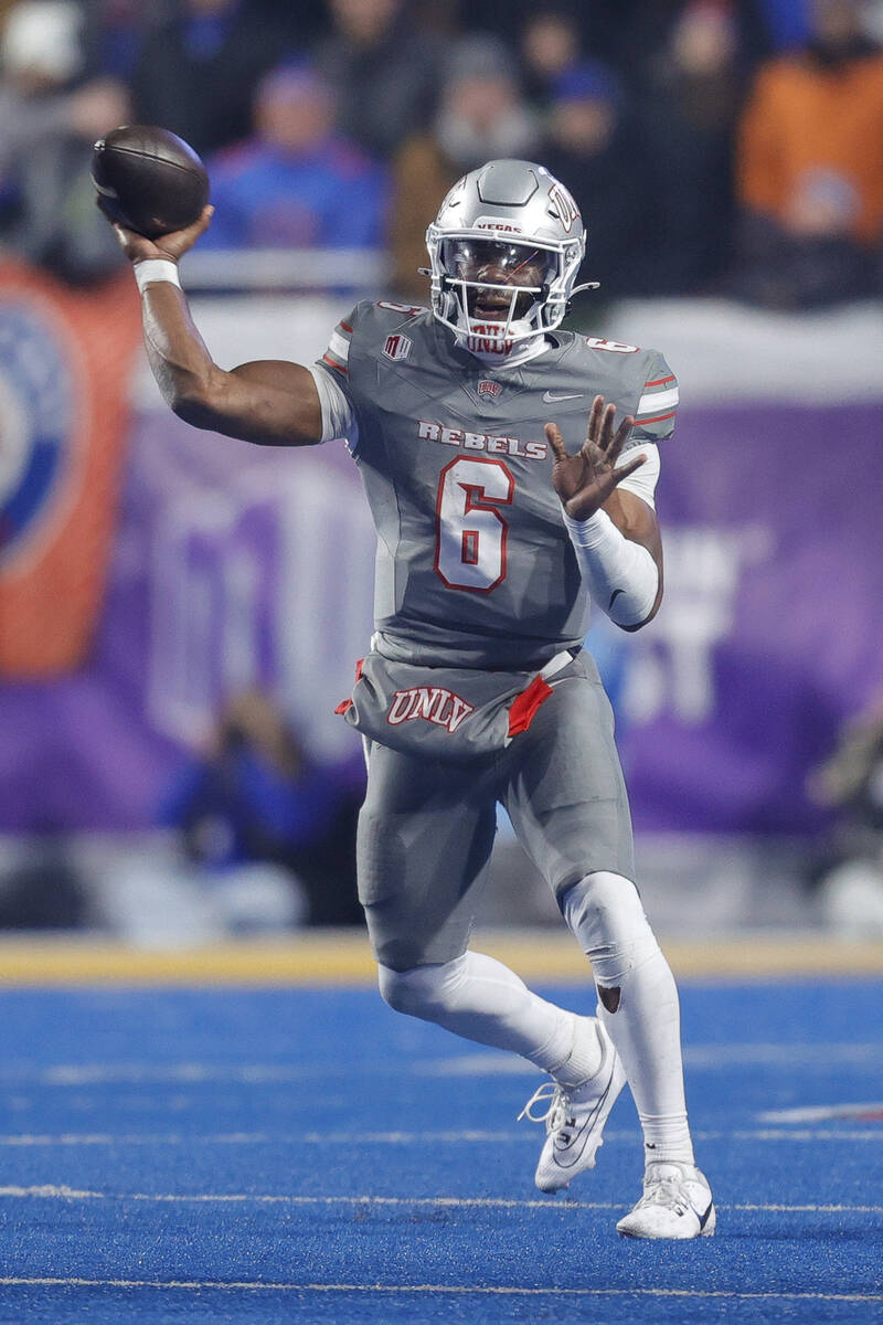 UNLV quarterback Hajj-Malik Williams (6) throws the ball against Boise State in the second half ...