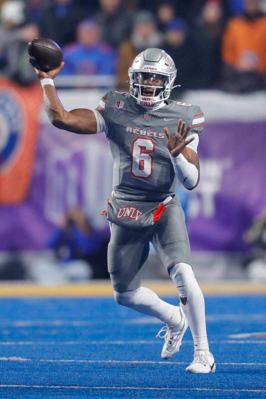 UNLV quarterback Hajj-Malik Williams (6) throws the ball against Boise State in the second half ...