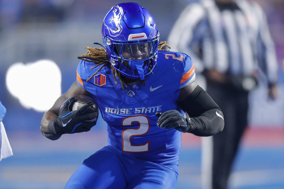 Boise State running back Ashton Jeanty (2) runs with the ball against UNLV the first half of th ...