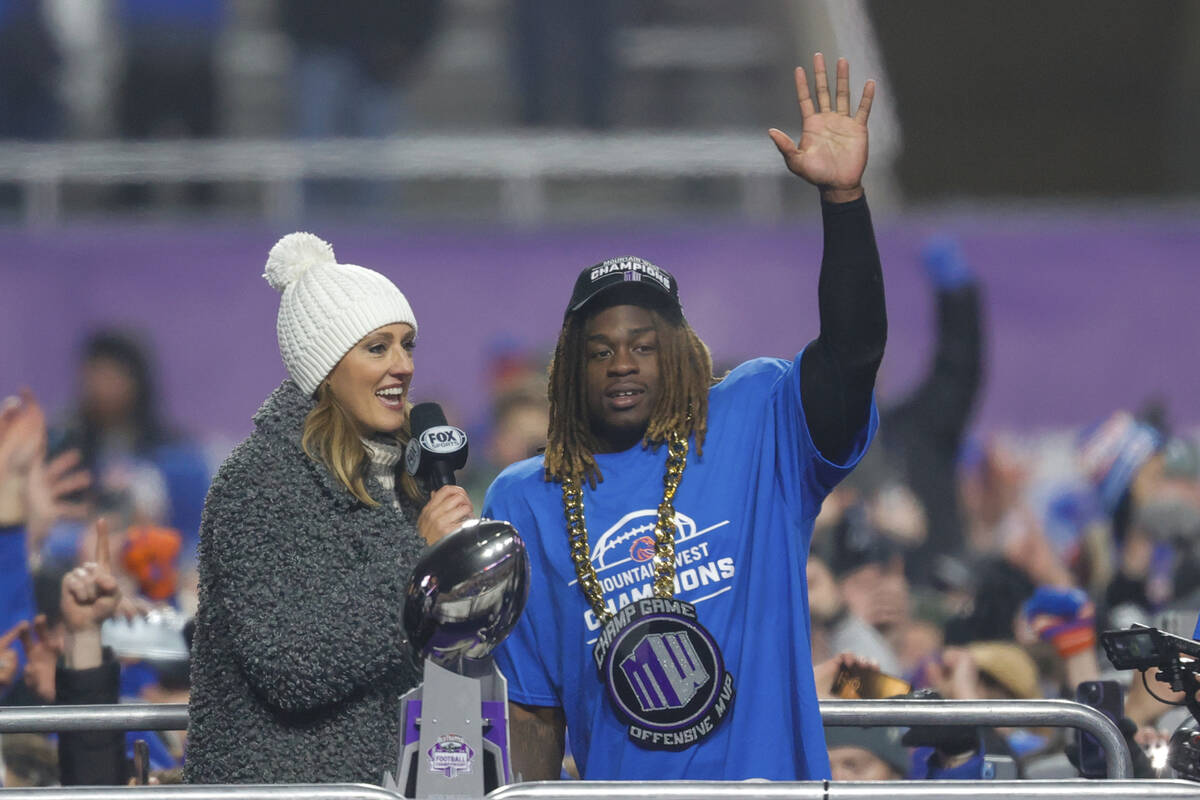 Allison Williams of Fox, left, interviews Boise State running back Ashton Jeanty, the offensive ...