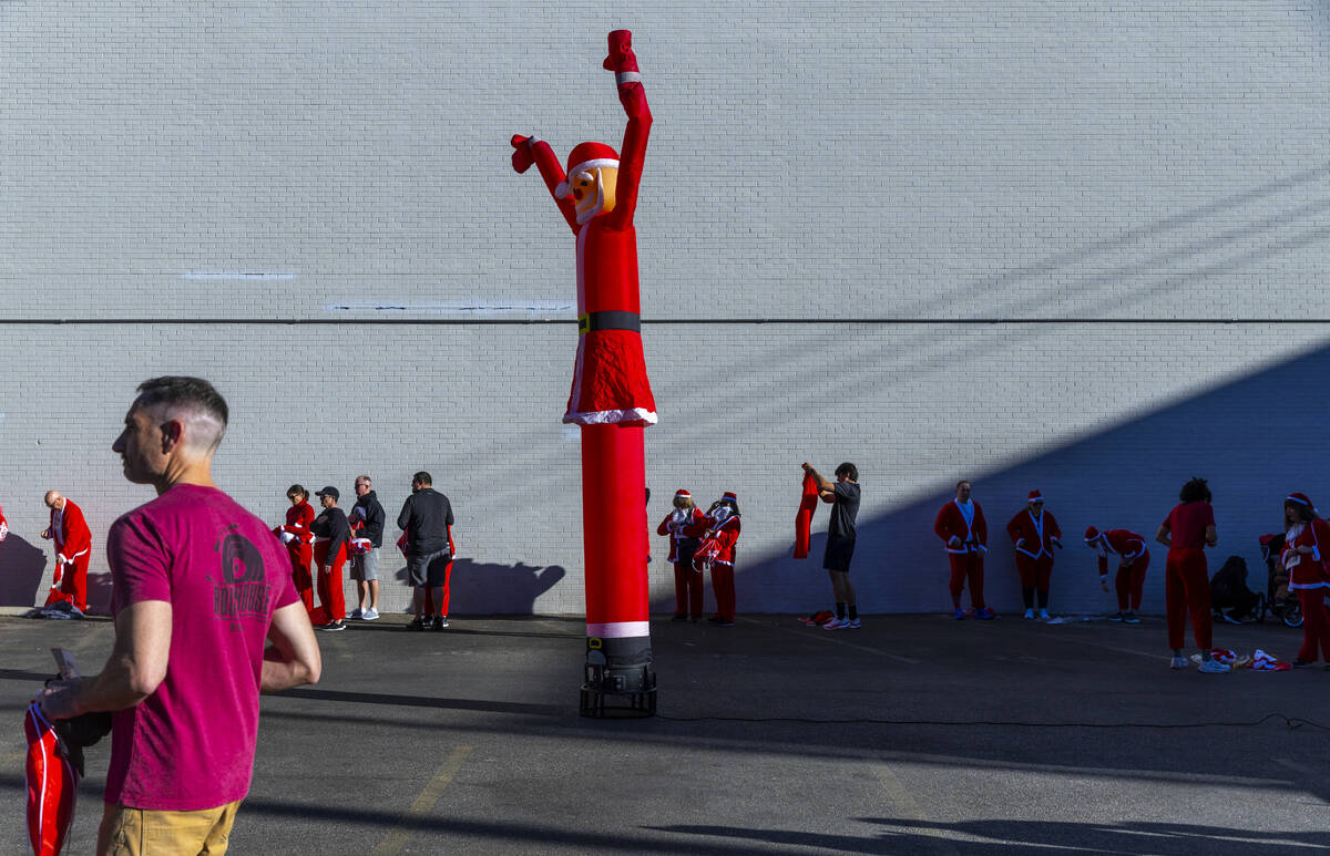 Entrants get dressed about the registration area across from the Downtown Las Vegas Events Cent ...