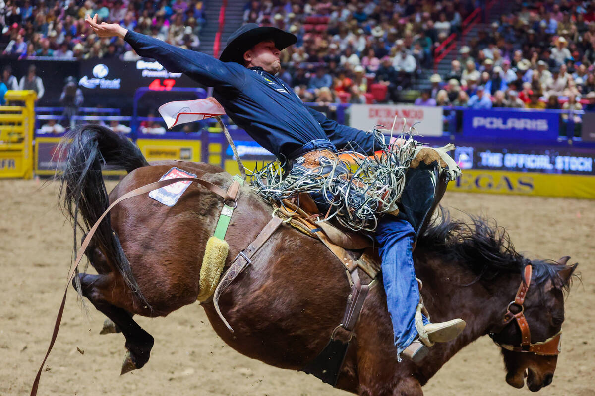 Saddle Bronc rider Brody Wells stays steady on Diamond Fever during round three of the National ...