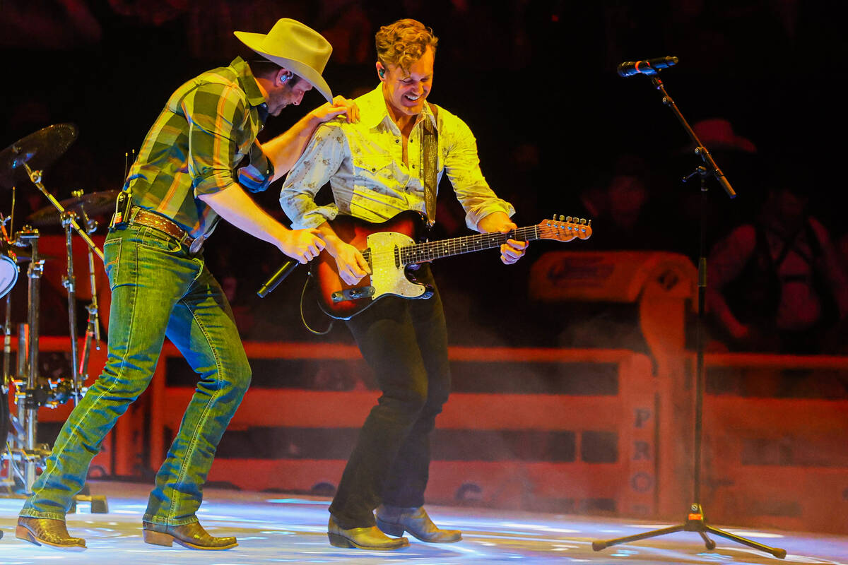 Easton Corbin performs during round three of the National Finals Rodeo at the Thomas & Mack ...