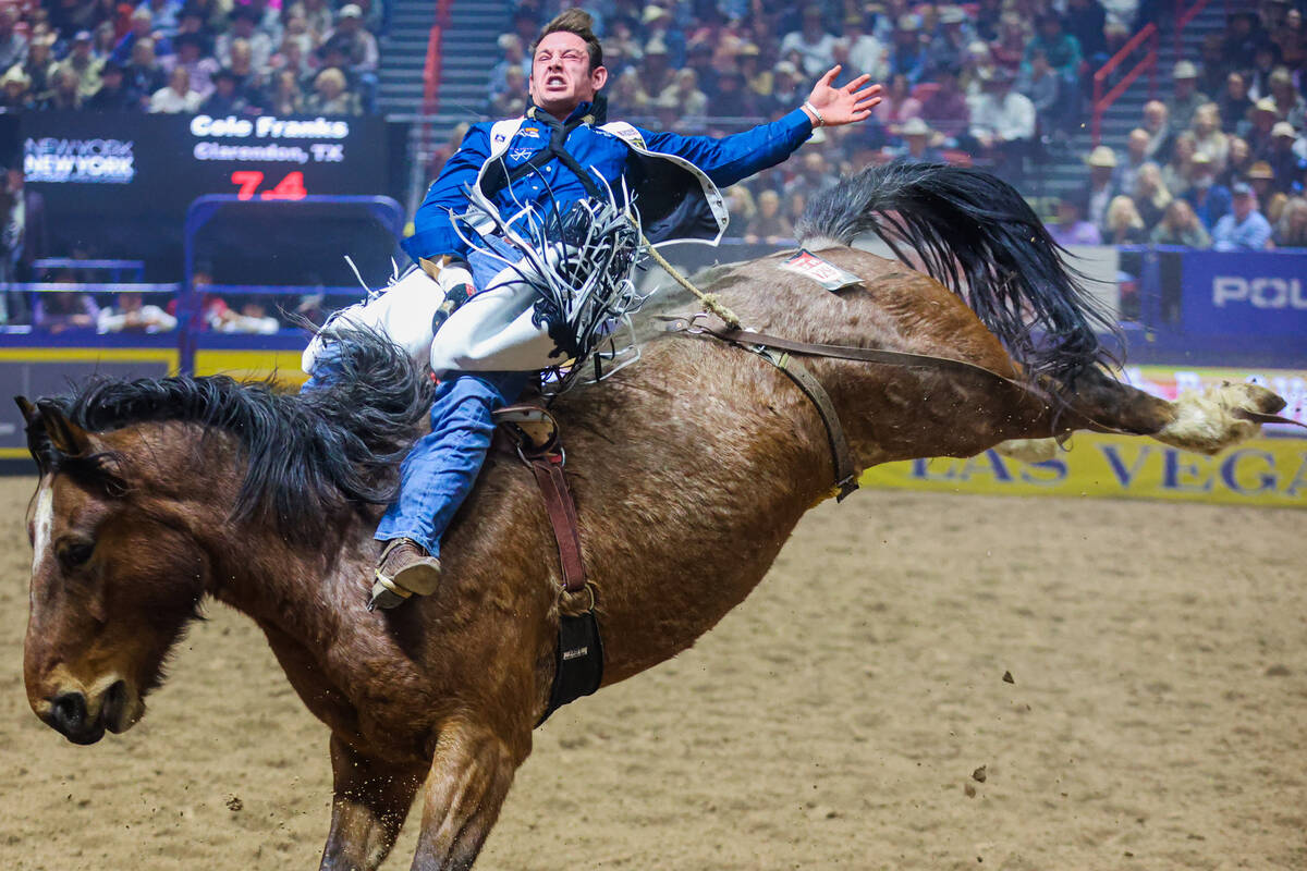 Bareback rider Cole Franks completes his ride during round three of the National Finals Rodeo a ...