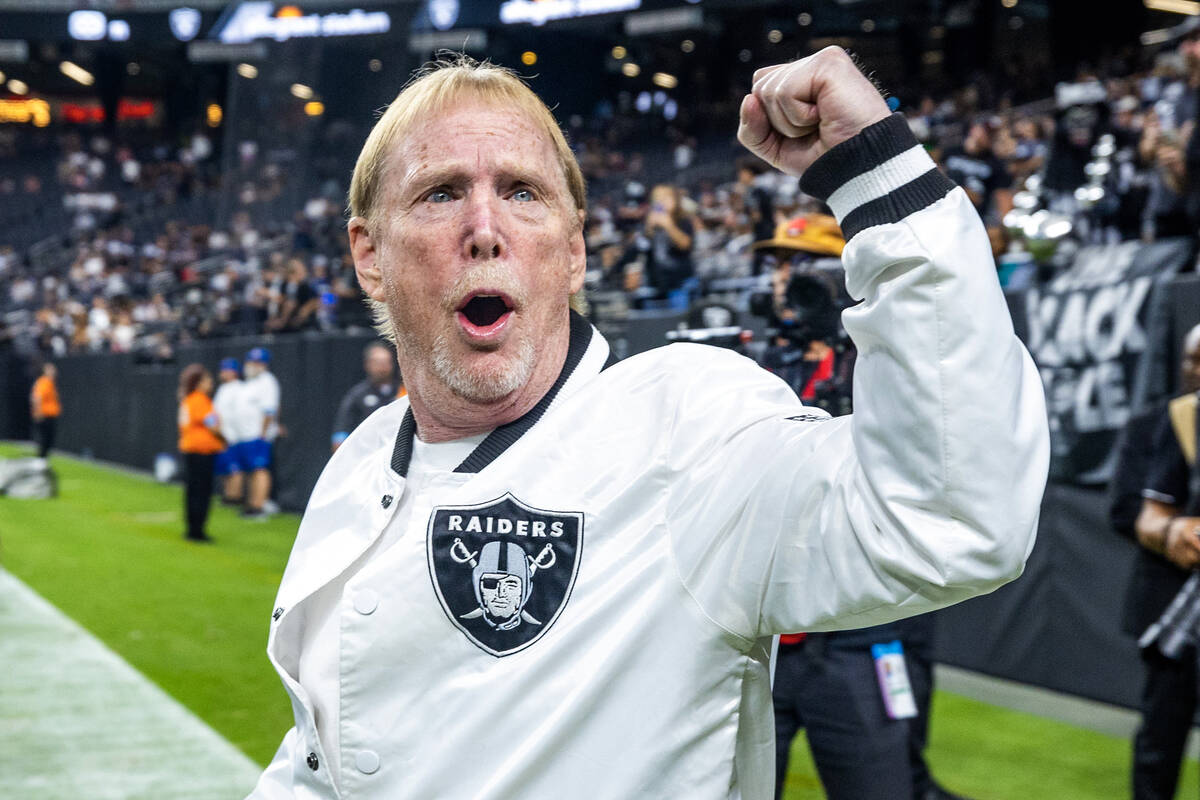 Raiders owner Mark Davis cheers with the crowd during warm ups before the first half of their N ...